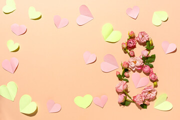 International Women's Day. Flower composition 8. Creative date. Heads of delicate roses on a light pastel beige background. Mockup postcard Mother's Day, March 8. Spring flower background, copy space