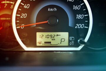 Car gauge speedometer with spanner sign indicating engine maintenance service schedule