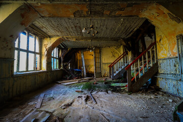 abandoned room with an old chandelier