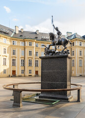 Fountain and statue of Saint George in Third courtyard of the Prague Castle near St Vitus Cathedral in Prague in Czech Republic