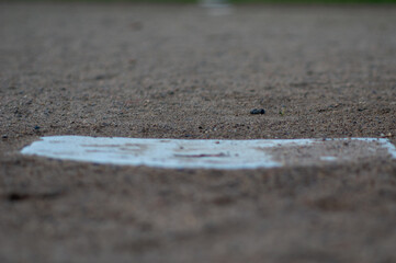Home plate with brown dirt