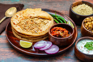 Sattu paratha, a stuffed flatbread from Uttar Pradesh and Bihar, is filled with spiced roasted gram...