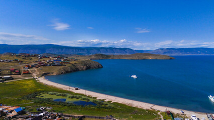flying over the village of Sakhyurt on the shore of Lake Baikal near the island of Olkhon