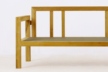 Modern wooden chairs made from teak wood with natural paint colors


