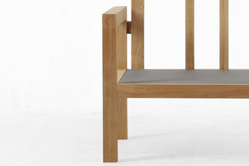 Modern wooden chairs made from teak wood with natural paint colors


