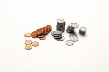 US coin ascending like a bar graph isolated on white table