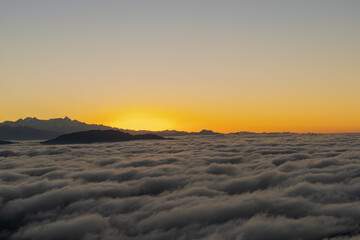 Beautiful clouds scape and Himalayas with clouds and morning sun rays