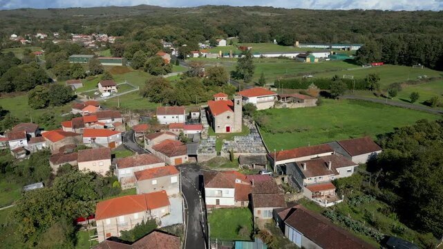 Drone shot of Santa Mar&iacute;a de Parada de Outeiro church and surroundings in Vilar de Santos, Spain
