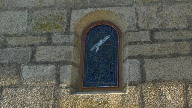 Medieval stone window of Santa Mar&iacute;a de Parada de Outeiro church in Vilar de Santos, Spain
