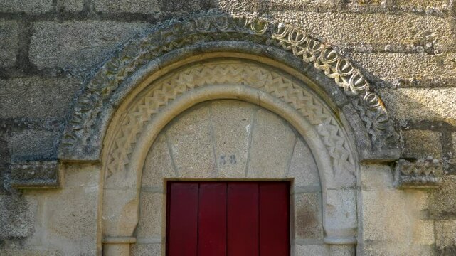 Ornate doorway at Santa Mar&iacute;a de Parada de Outeiro church in Vilar de Santos, Ourense, Galicia