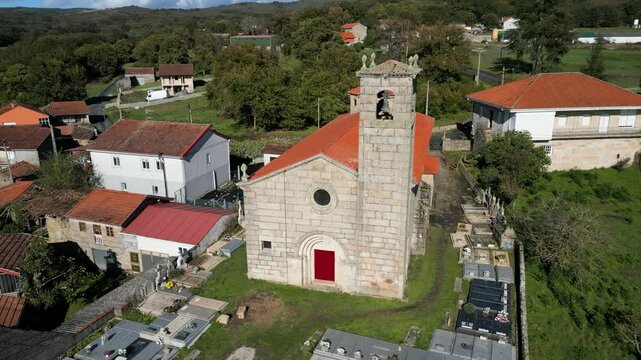 Drone shot capturing Santa Mar&iacute;a de Parada de Outeiro church in Vilar de Santos, Galicia, Spain