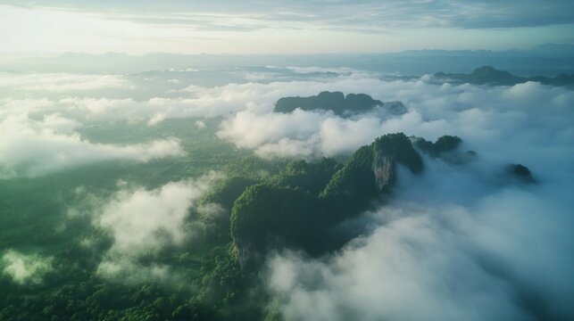 The sky is covered in clouds and the mountains are visible in the distance