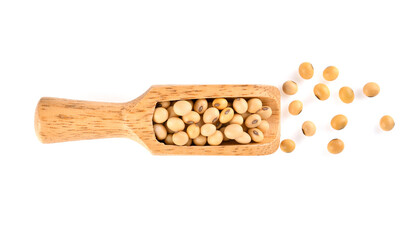 Soybean seeds in wooden spoon isolated on white background , top view , flat lay.