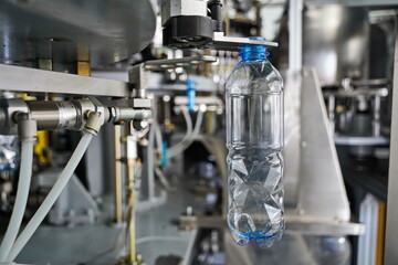 A plastic bottle in the equipment for inflating in different volumes and liters.