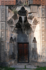 Portal of ruined Neghuts Monastery. Arzakan village, Armenia.