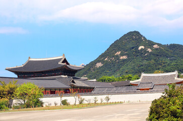 Ancient pavilions of Gyeongbokgung Palace, Seoul, South Korea. Beautiful landscape with Gyeongbokgung Palace complex and Inwangsan Mountain,  Seoul, Republic of Korea
