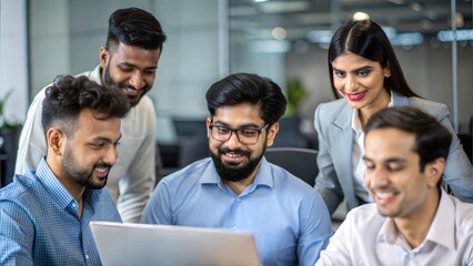 A diverse group of Indian professionals collaborating in an open-office tech environment.
