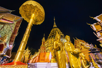 Wat Phra That Doi Suthep is a Buddhist temple is a major tourist attraction Is an ancient Thai art with Twilight blue bright at dusk night and Public places in Chiang Mai,Thailand.