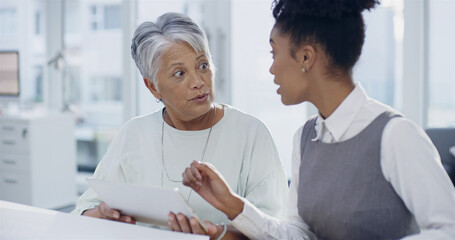 Obraz premium Business women, tablet and discussion in boardroom with report, team and review at company. People, mentor and touchscreen with project, feedback and research for risk management at insurance agency