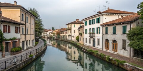 Naklejka premium Picturesque Canal in a Charming European Town with Traditional Architecture, Minimalist Style, Tranquil Scene, Serene Waters, European Heritage, Quaint Streets, Timeless Beauty