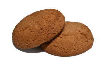 Round shaped oatmeal cookies lie on a white background.
