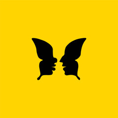 a butterfly whose wings are silhouettes of the faces of a girl and a guy