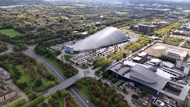 Aerial view establishing contemporary iFLY indoor skydiving centre near Campbell park Milton Keynes