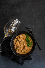 beef stroganoff dish served in the bowl