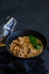 beef stroganoff dish served in the bowl