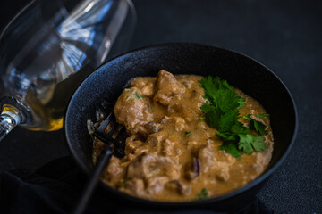 beef stroganoff dish served in the bowl