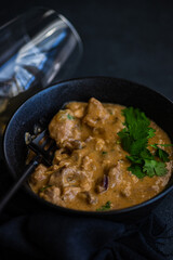 beef stroganoff dish served in the bowl