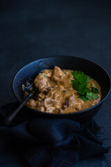 beef stroganoff dish served in the bowl