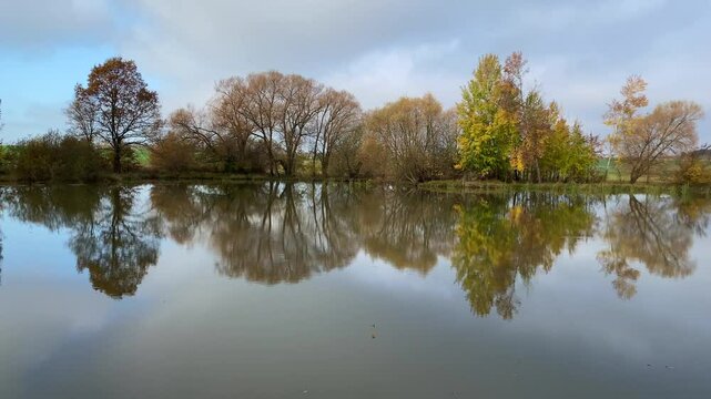 Autumn reflection on the fishing pond