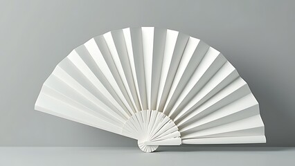 Mockup of a white folding hand fan set apart against a white background