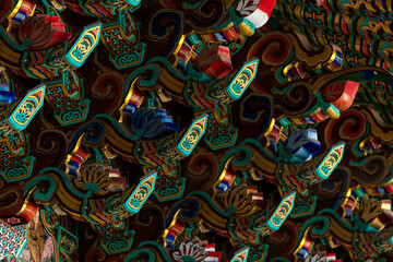 decorated eaves of the traditional Korean building in the Buddhist temple