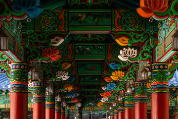wooden ceiling of the corridor in the Buddhist temple