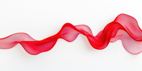 Fototapeta premium A flowing, sheer red ribbon twists elegantly against a white background, embodying a sense of grace and beauty.