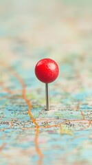 A red location pin highlights a designated area on a detailed map indicating various geographical features and routes