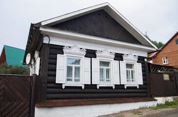 Elements of a beautiful wooden houses. Irkutsk from various perspectives. Variety of architectural styles.