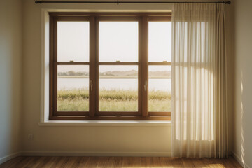 A cozy bedroom with a large window letting in natural light