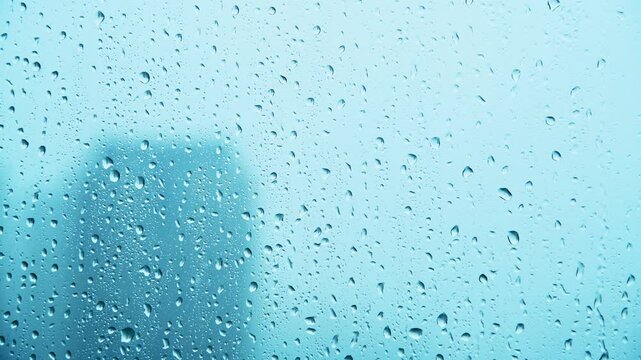 Look at the city through the raindrop window
