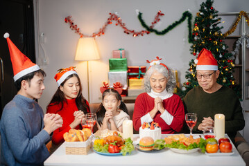 Joyful Asian family celebrating Christmas together with gifts, festive food, and decorations, capturing love,