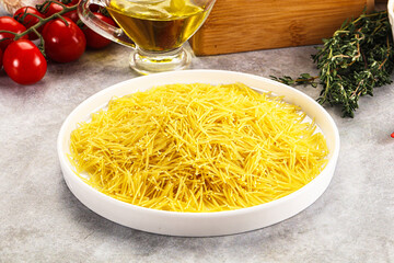 Raw dry Italian pasta Vermicelli