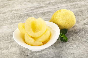 Canned yellow pear with syrup