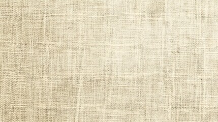 Fototapeta premium A soft linen fabric background, light beige color with a gentle, natural weave
