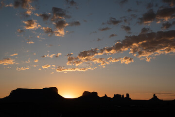 Monument Valley rock formations at sunrise