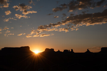 Monument Valley rock formations at sunrise
