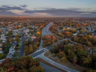 Aerial Suburban Sunset with Autumn Foliage