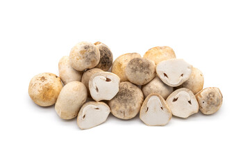 Pile of fresh straw mushrooms cut in half isolated on white background.