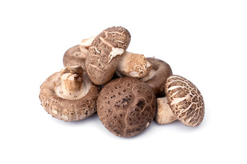 Pile of fresh shiitake mushrooms isolated on white background.